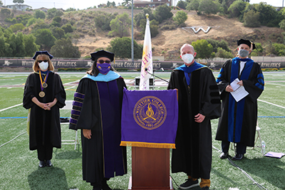 Faculty and staff at commencement