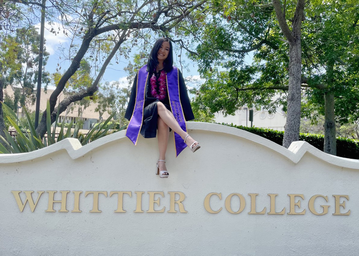 Maya Choi on Whittier College sign
