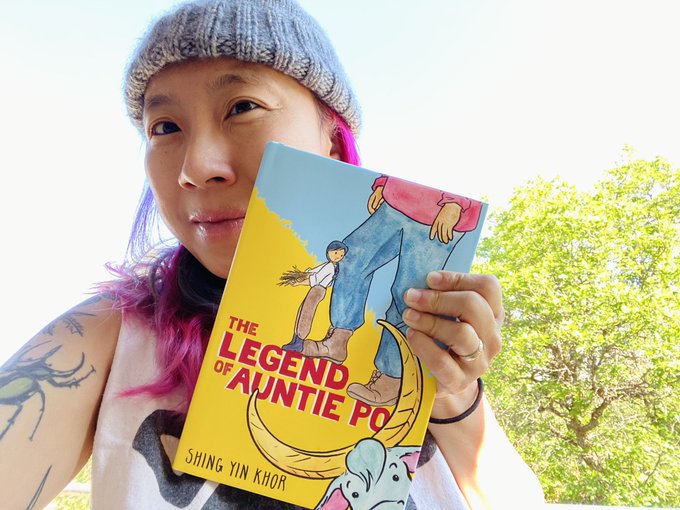 Shing Yin Khor holding book The Legend of Auntie Po
