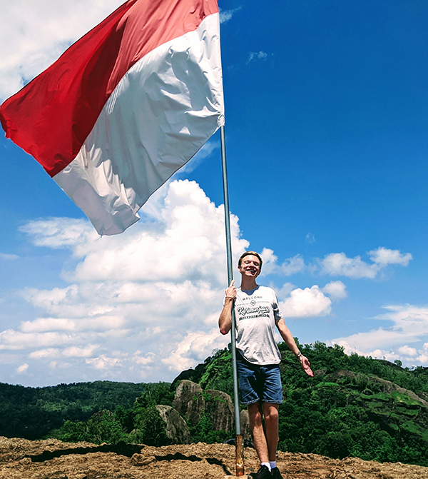 Ryan Smith with a flag