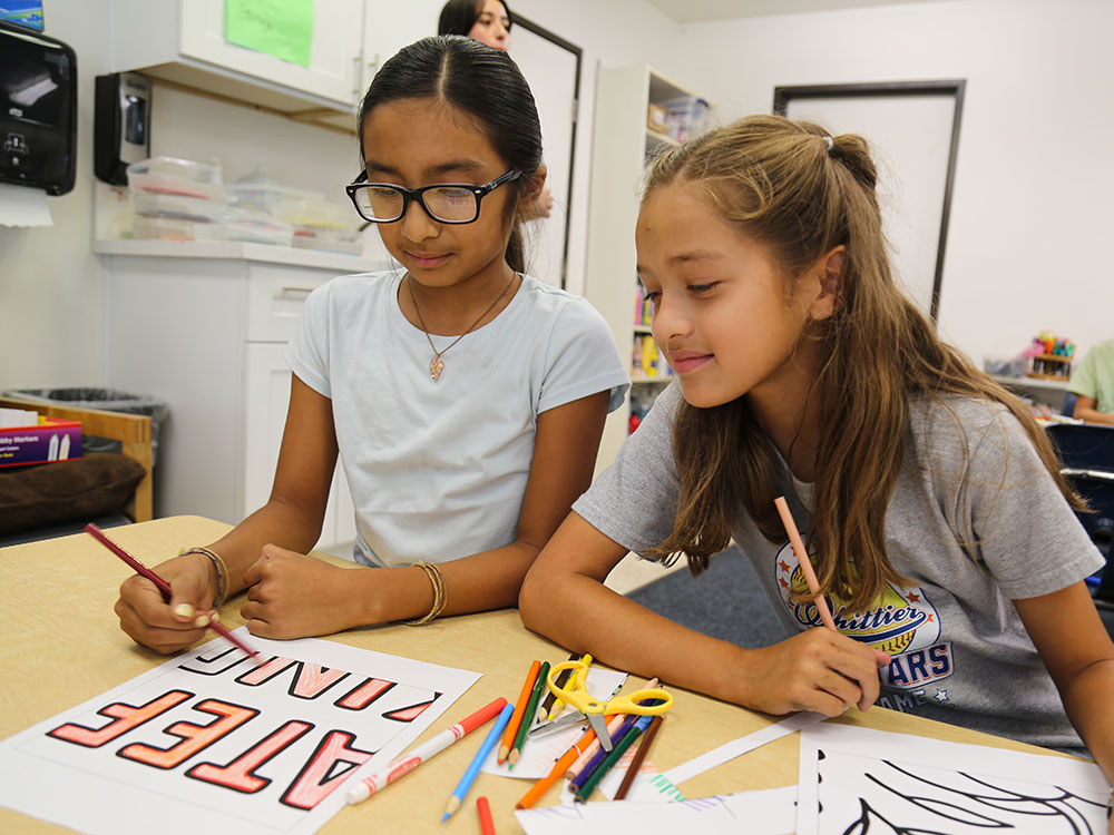 Two students in a classroom