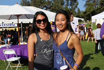 Two women standing next to each other