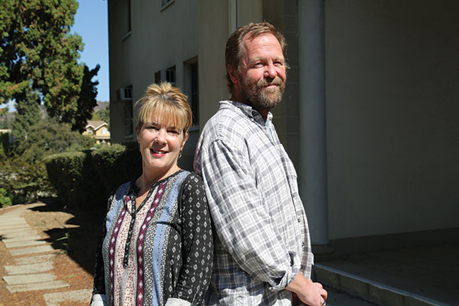 Professors Doreen O'Conner-Gomez and Paul Kjellberg outside Wardman Hall.