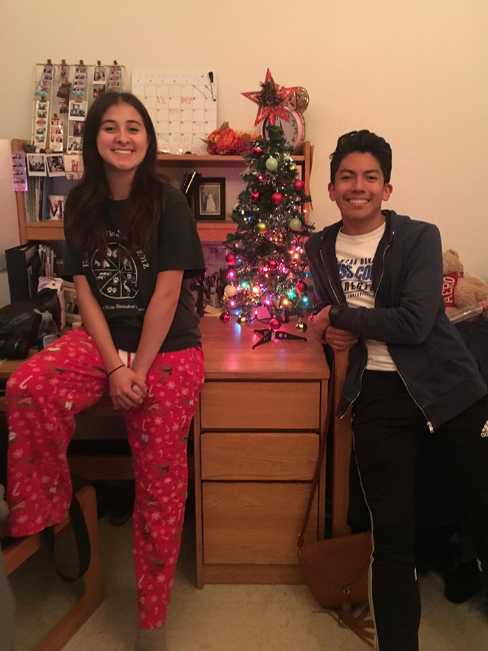 ricardo and friend in a residence hall room