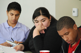 Latino students thriving at Whittier College despite national trend.