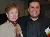 City Administrative Office and Whittier alumnus Miguel Santana strikes a pose with President Sharon D. Herzberger.