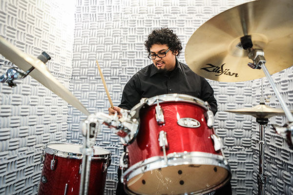 Student playing drums