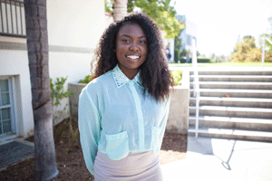 Kourtney Broadnax stands on campus