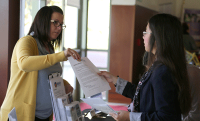 student speaking to employer