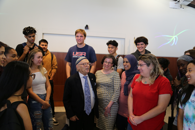 Eisenbach speaking to students and faculty