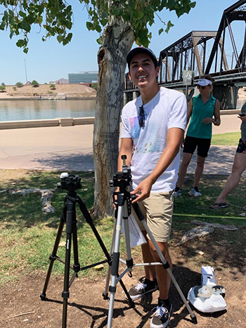 Manny Herrera conducting environmental research