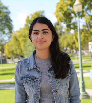 Christina Ibarra stands on campus