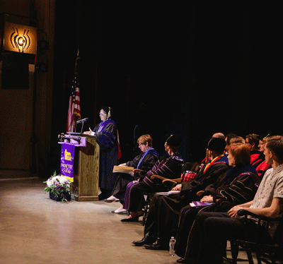 Kathy Barlow giving speech