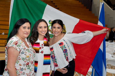 Latinx graduate and family