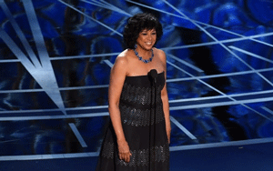 Sheryl Boone Isaacs on the stage at the Oscars