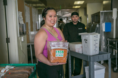 Christina Fong collecting left over food