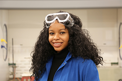 Olive Anagu in the organic chemistry laboratory, where she conducted research on milk.