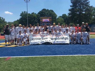 lacrosse team stands together for a photo