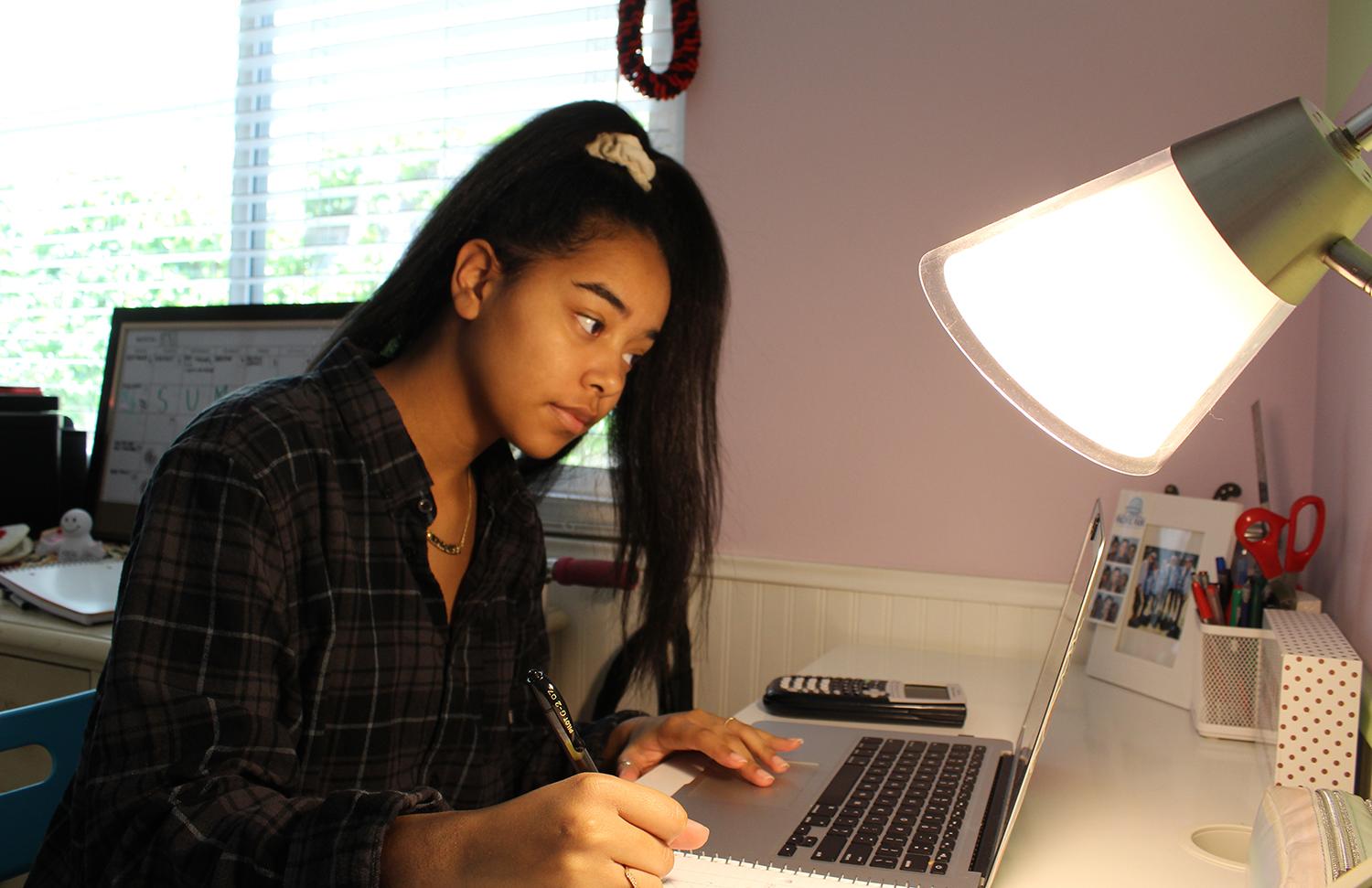Nicole Collins at her desk