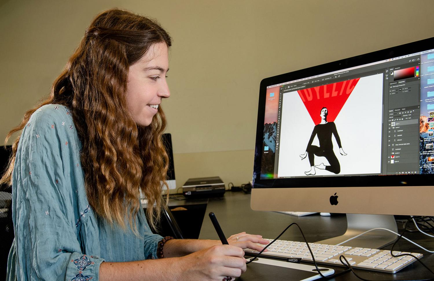 Lauren Swintek doing graphic design