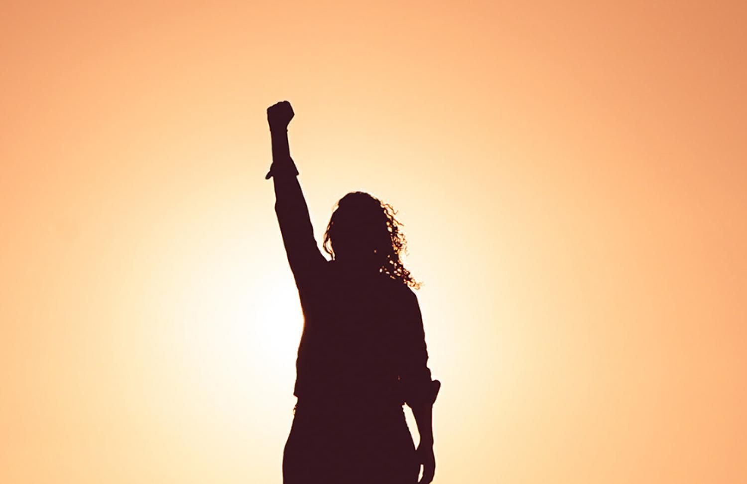 Woman raising arm