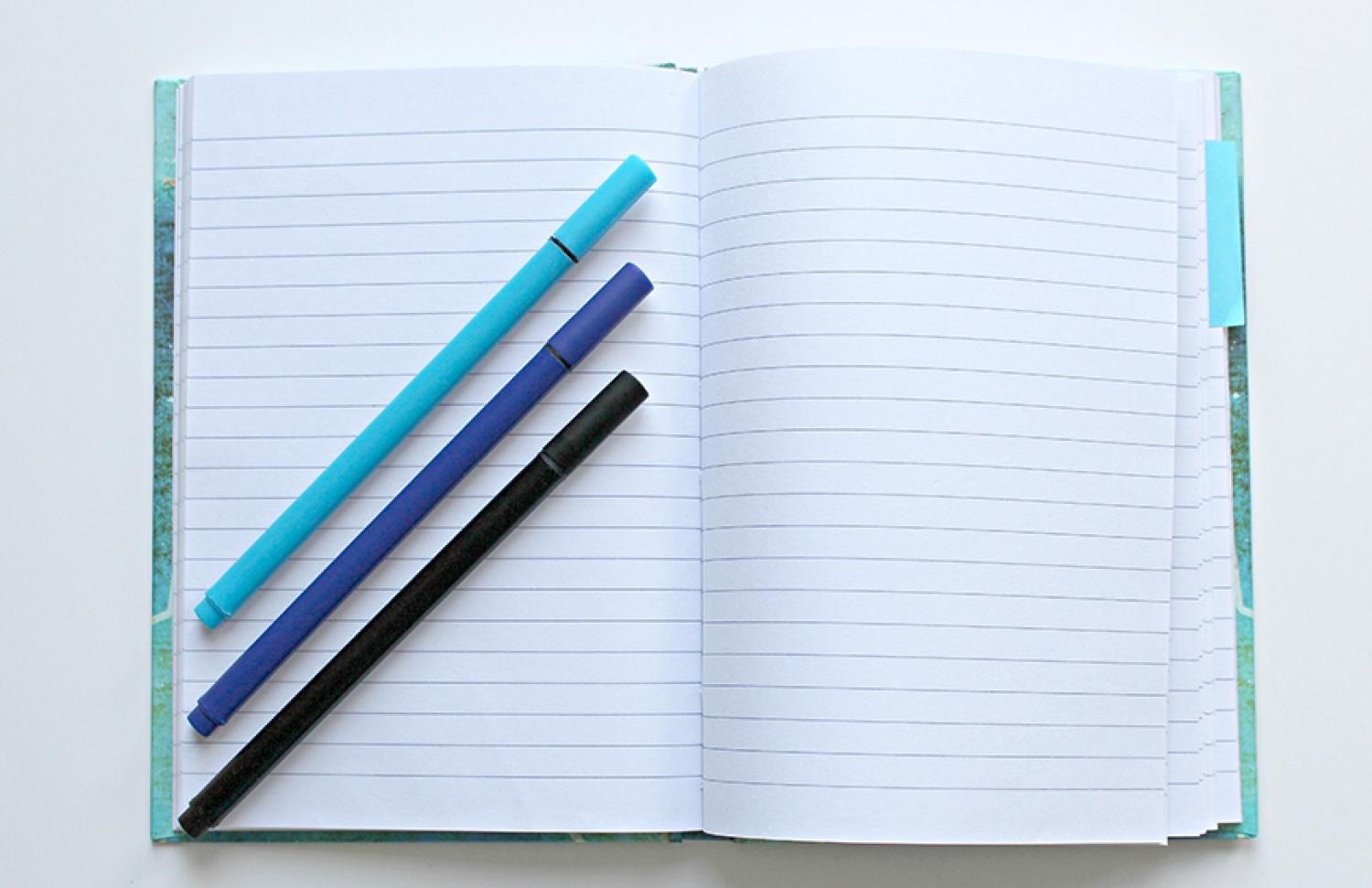 Notebook and pens