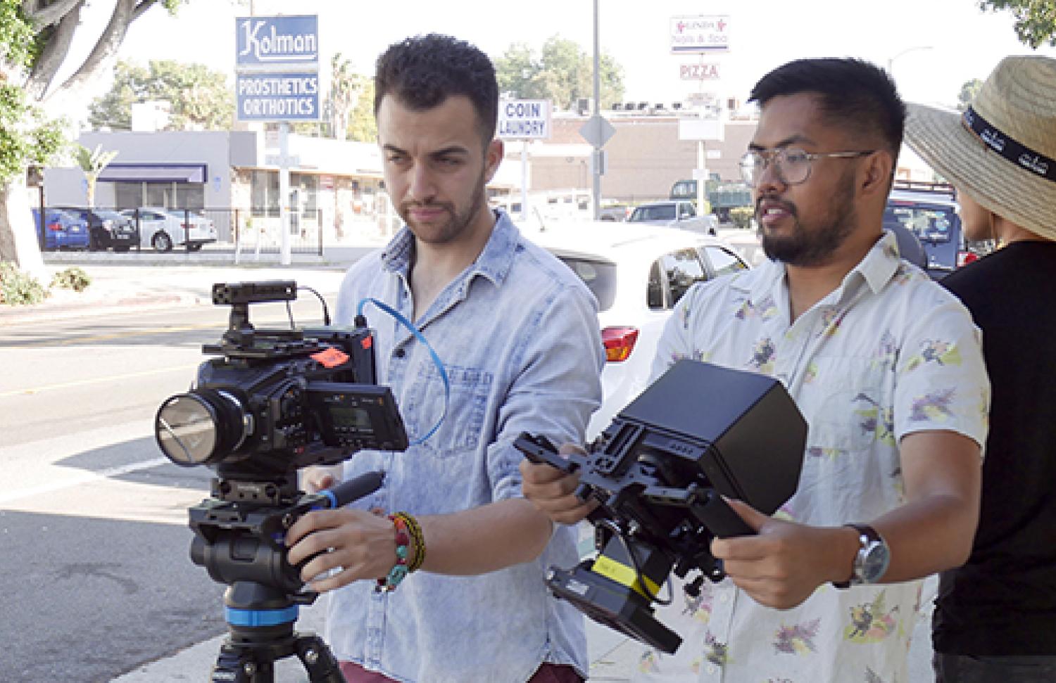 Two young men on set