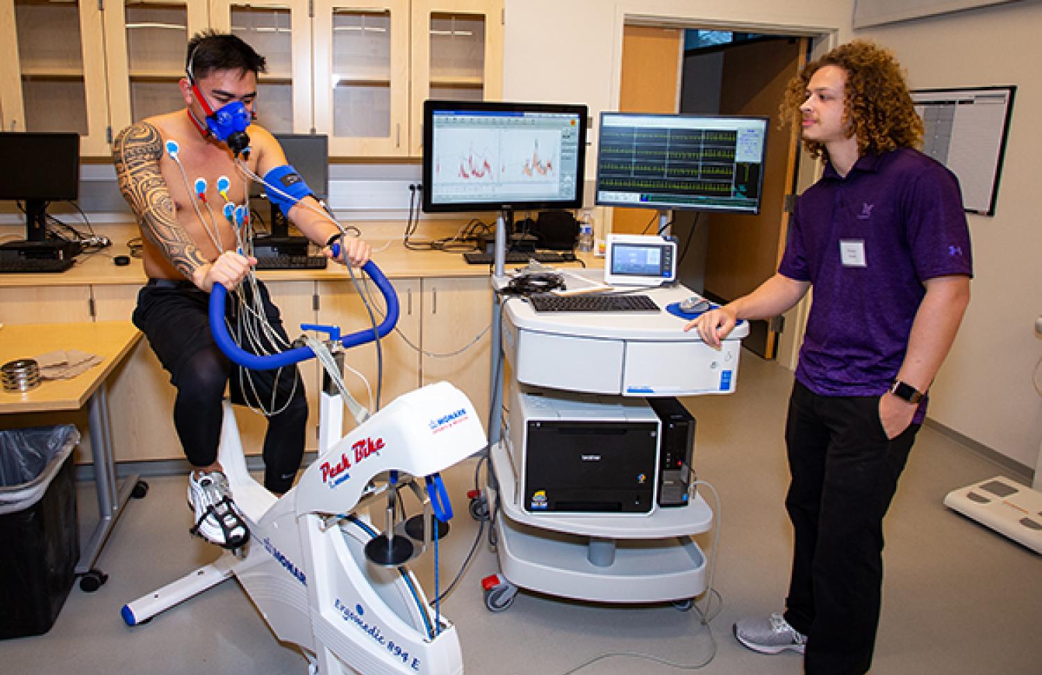 Two students in kinesiology lab