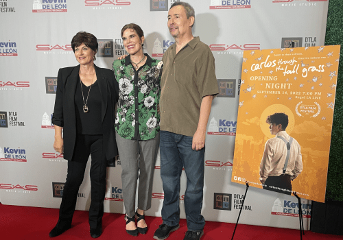 Patti McCarthy, Jennifer Holmes, and Rick Dominguez on the red carpet