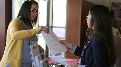 student speaking to employer