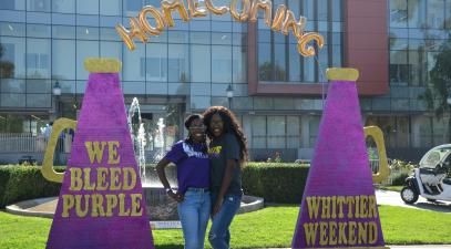 Two students standing in front of the Science and Learning Center