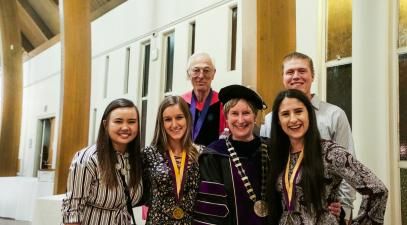 Students and faculty with President Herzberger