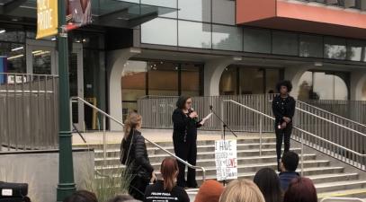 President Linda Oubré and Journee Bradford '21 in front of Science and Learning Center