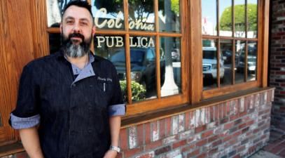 Ricardo Diaz stands in front of restaurant