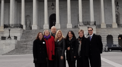 group in front of the state capitol