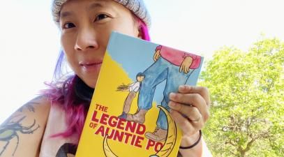 Shing Yin Khor holding book The Legend of Auntie Po