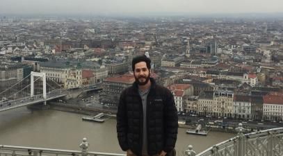Seth Feldman in front of the Budapest skyline.