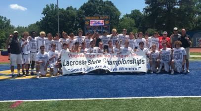 lacrosse team stands together for a photo