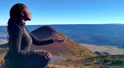 student on mountain top