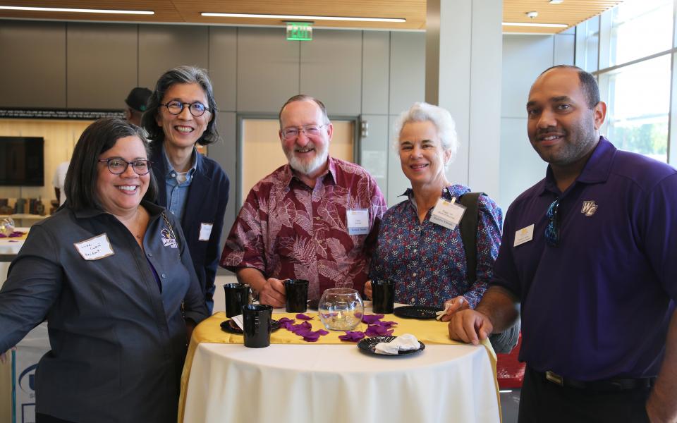 alumni with President Oubré and VP of Enrollment