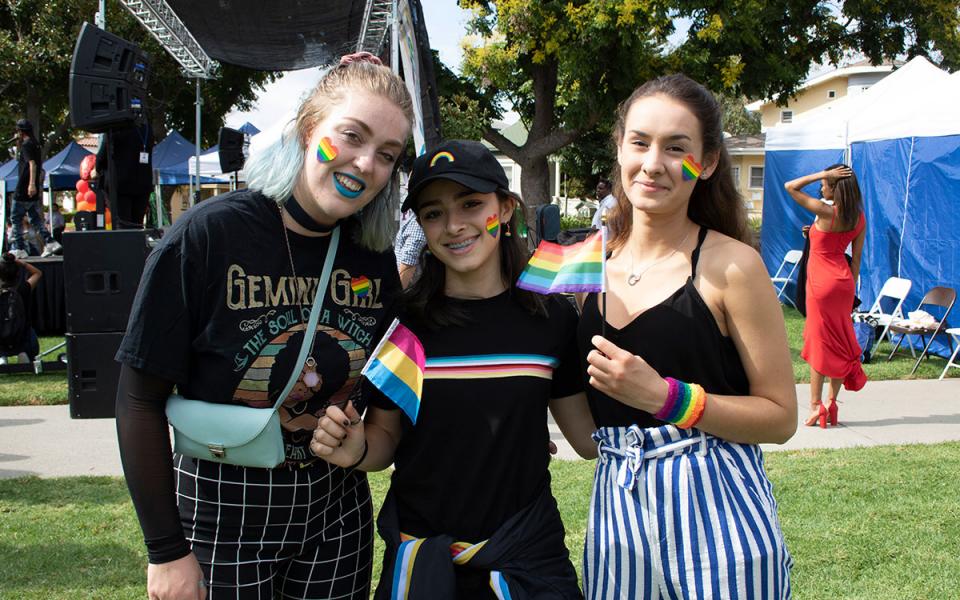 Three people at the City of Whittier's pride festival.