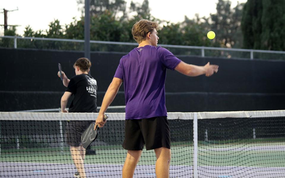 Student with a pickleball