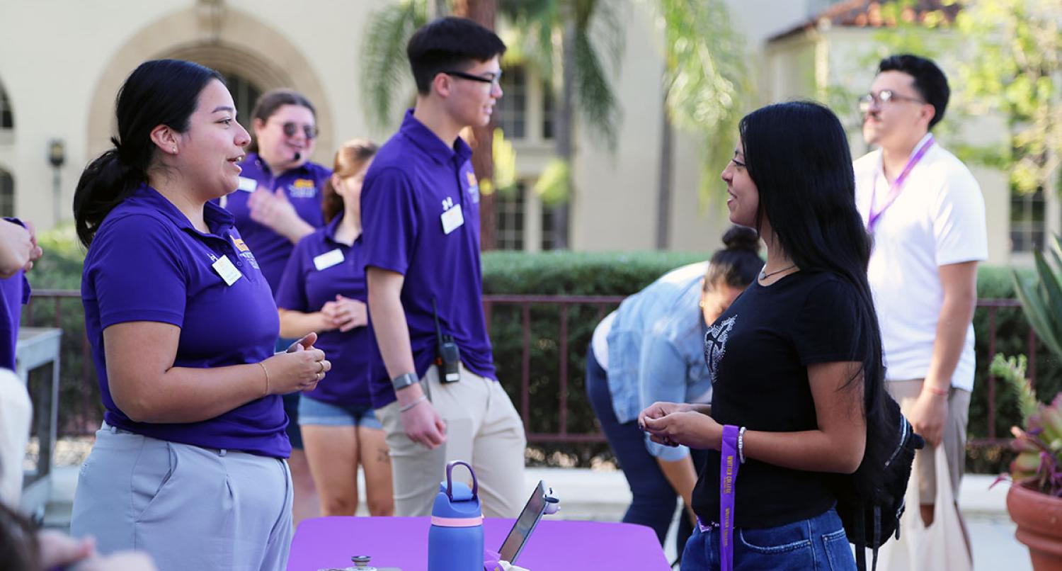 Admission counselor talks to admitted student