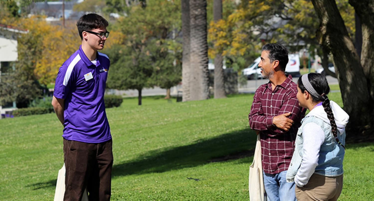 Tour guide and two visitors