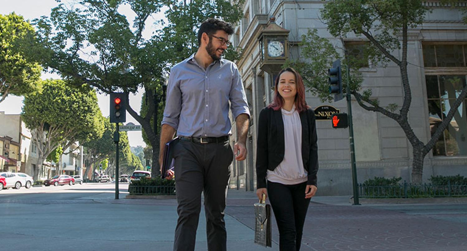 Two students walking in Uptown Whittier