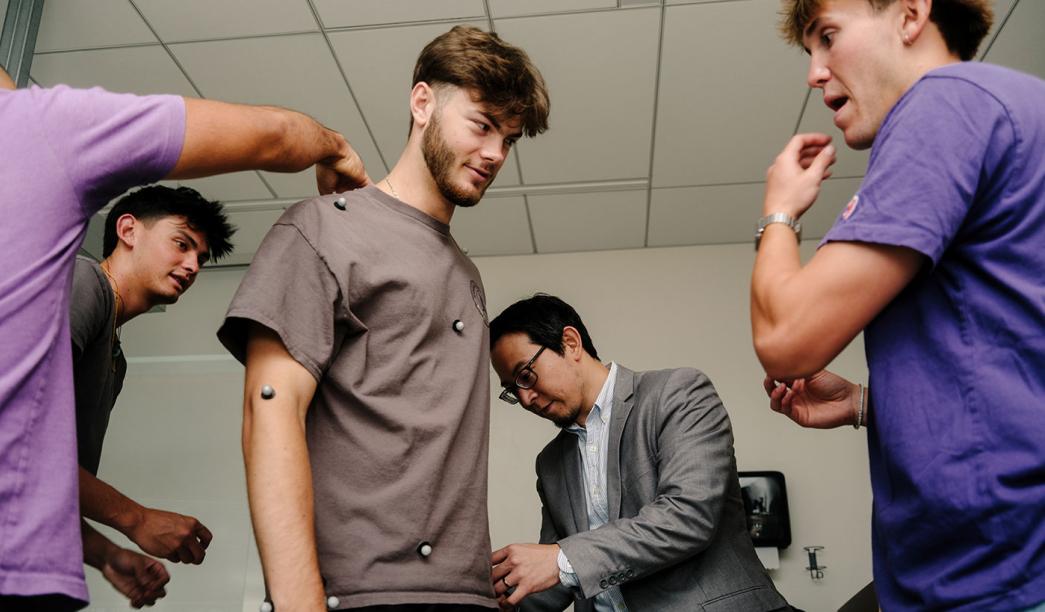 Students and professor in a lab